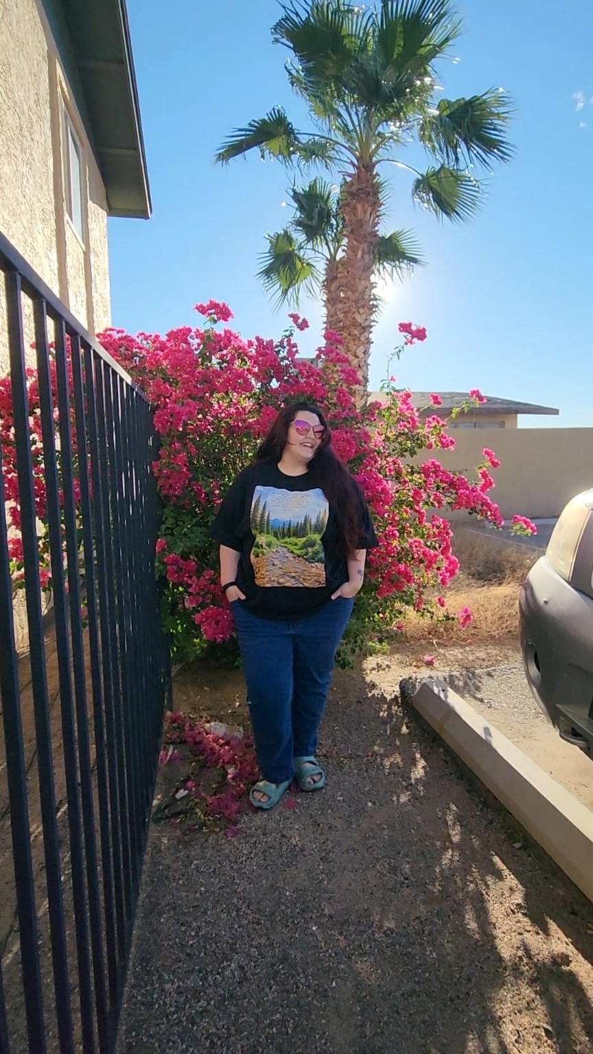 Destinie wearing the Isaiah 43:2 black T-shirt